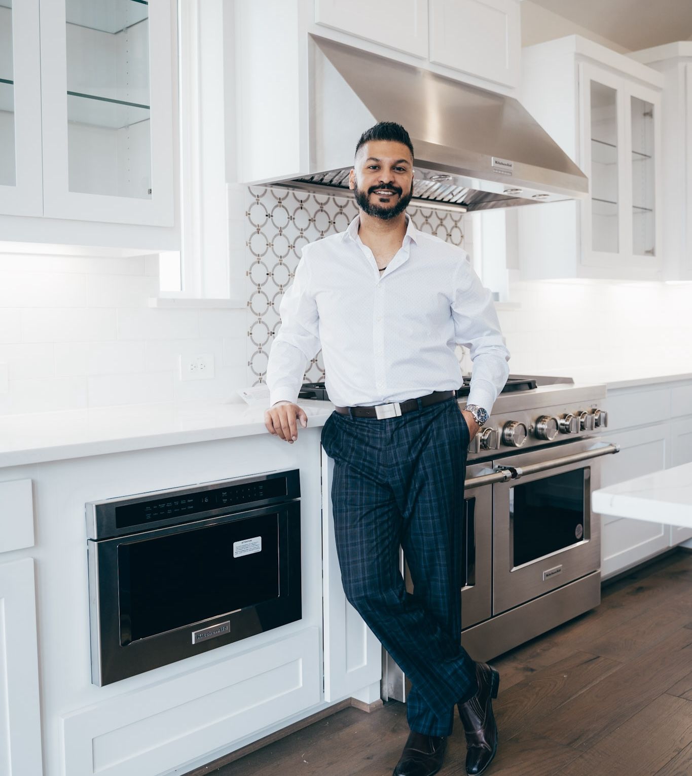 Thomson Thomas in the kitchen of a new construction home in DFW